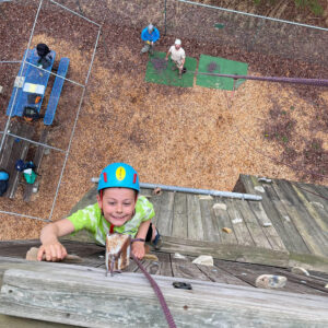 Climbing the 40' wall at Durant Scout Reservation